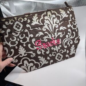 Thirty-One insulated lunch bag in the brown Parisian Pop print with "Snacks".